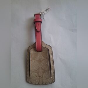 New Coach Luggage Tag In Sing.Pink/Tan/Brown Color New With Tags